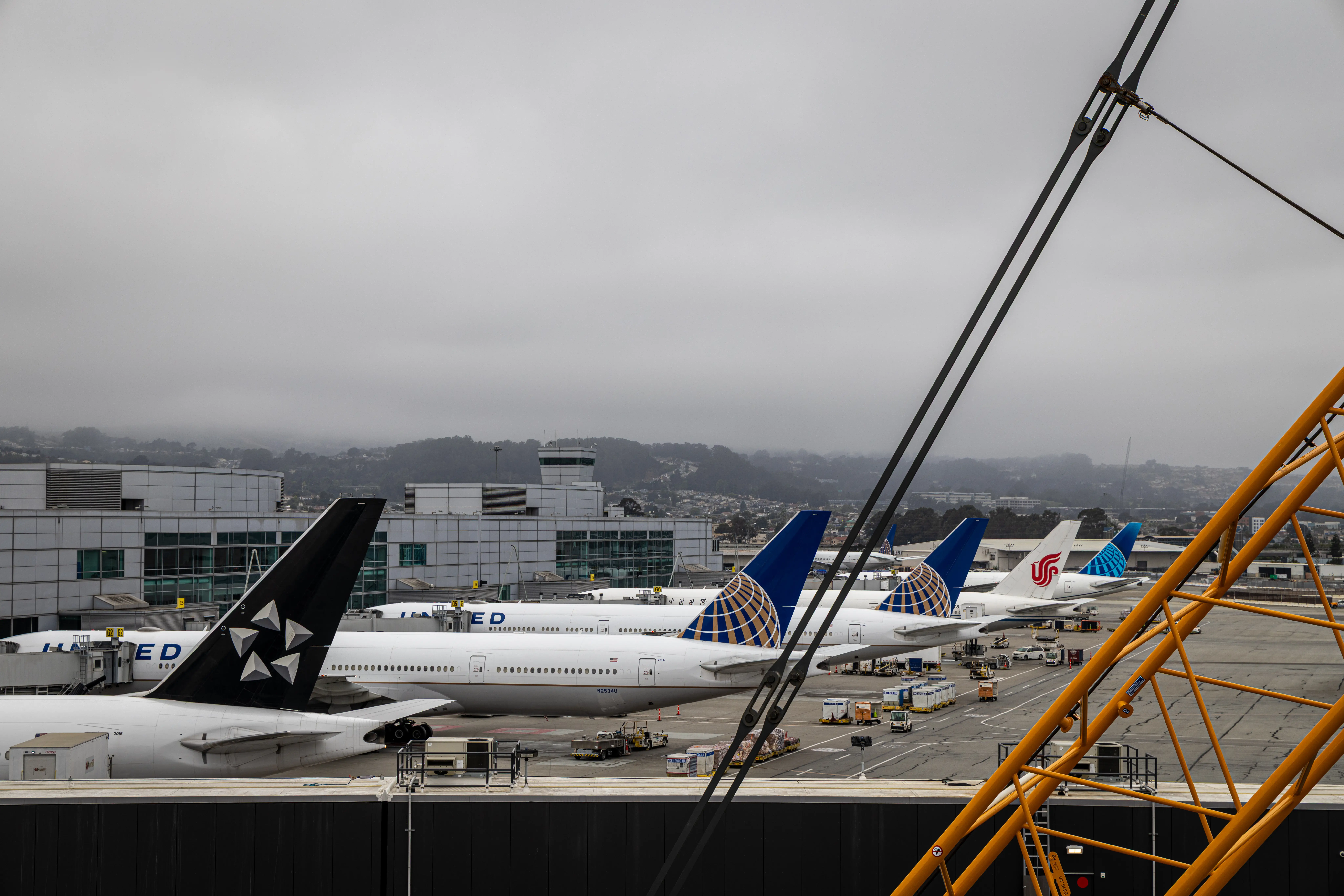 Passenger plans parked at the gate at SFO Airport