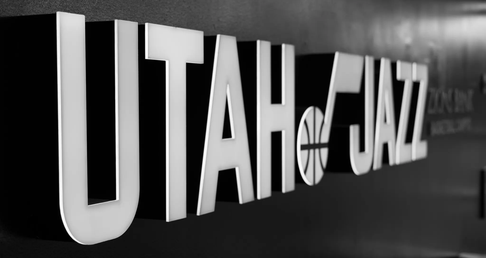 Utah Jazz logo on wall, black and white
